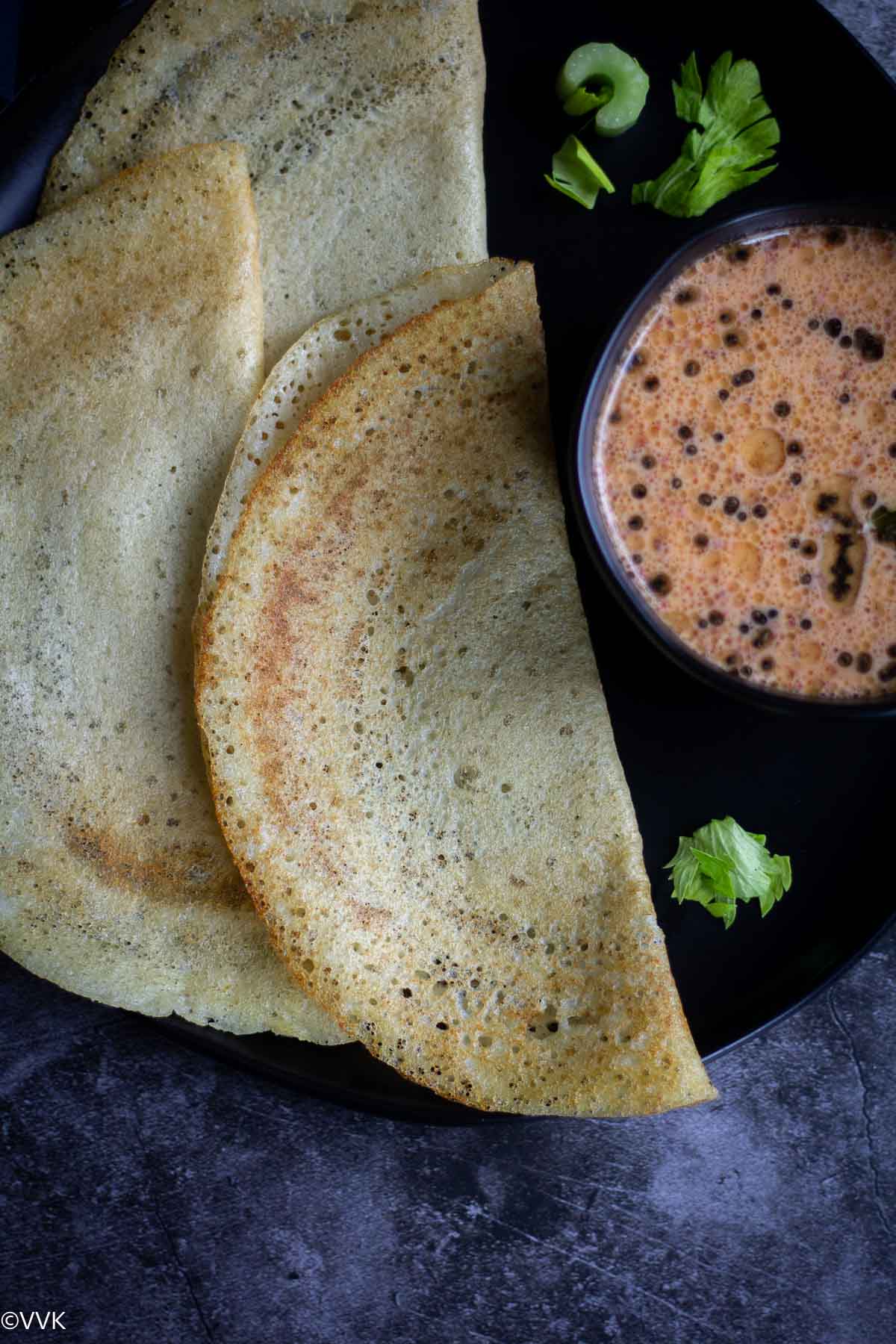 overhead shot of crispy celery dosa with chutney