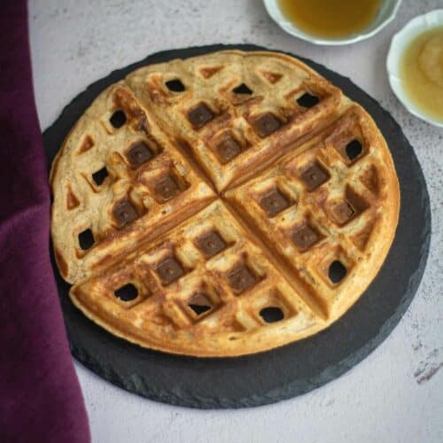 quinoa waffles served on a black slate board