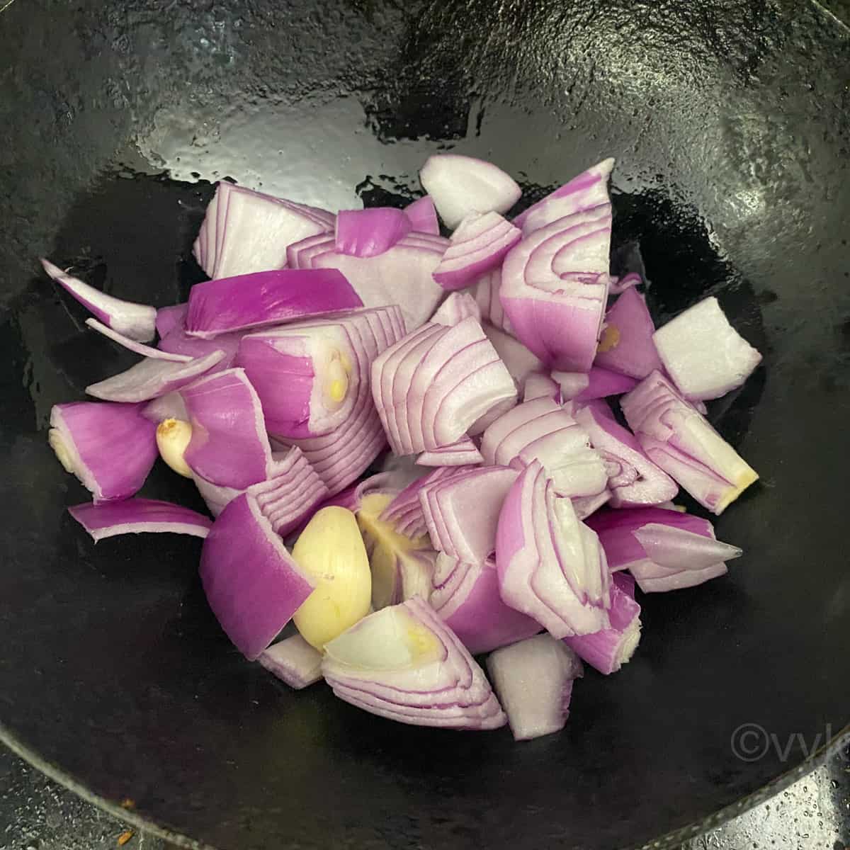 adding chopped onion and garlic