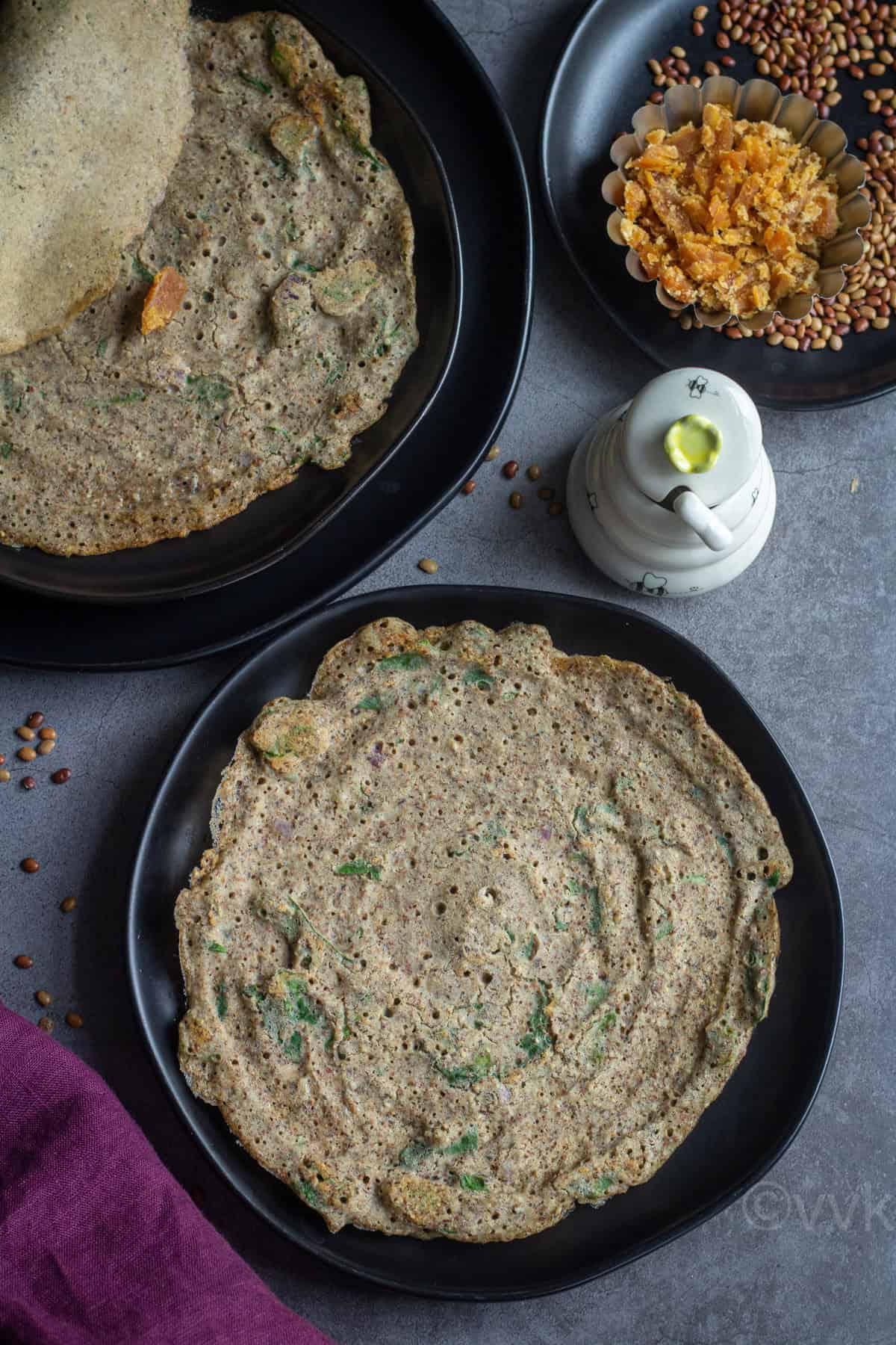 overhead of kollu adai served with jaggery and honey