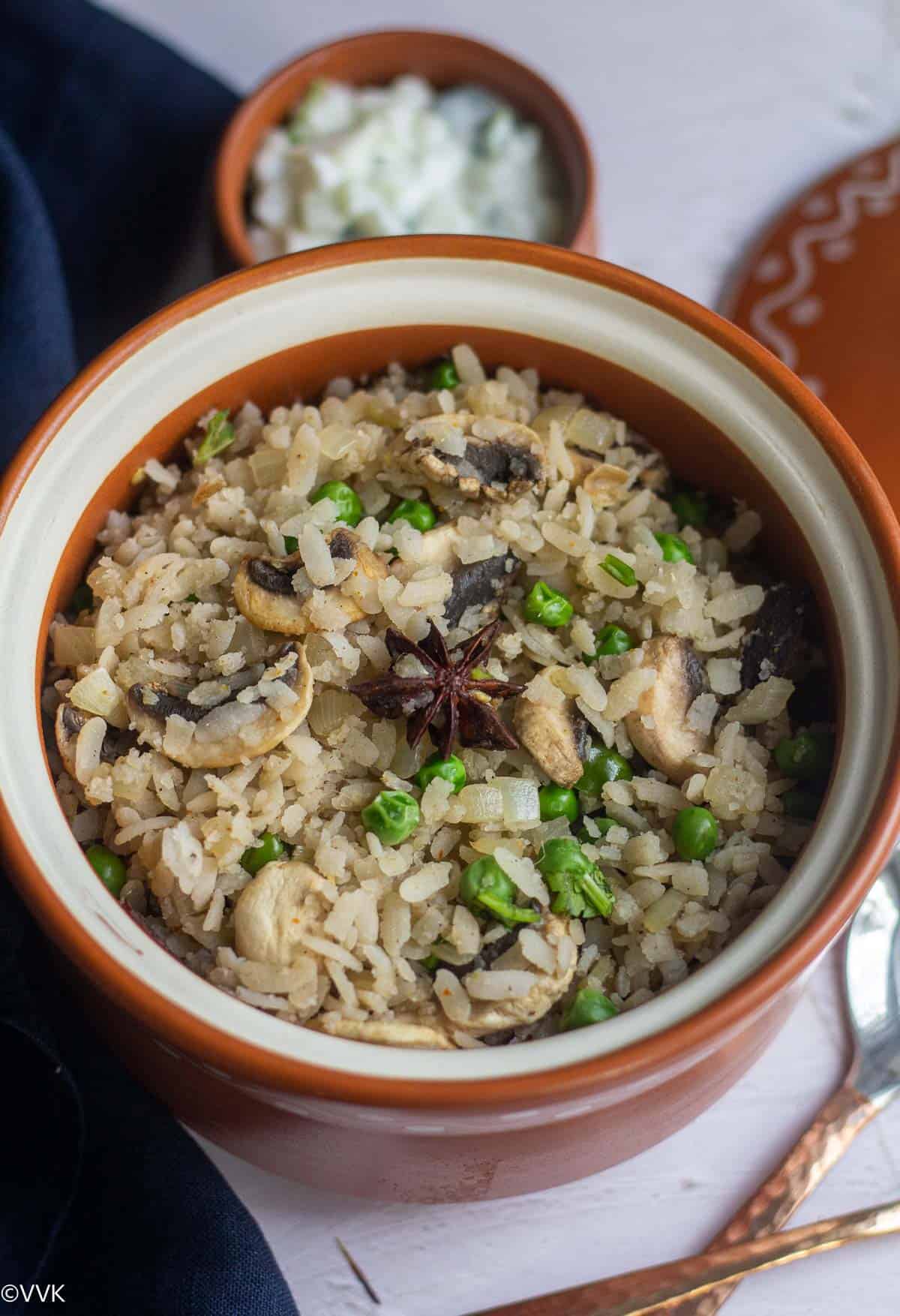 close up shot of poha pulao served in ceramic serveware