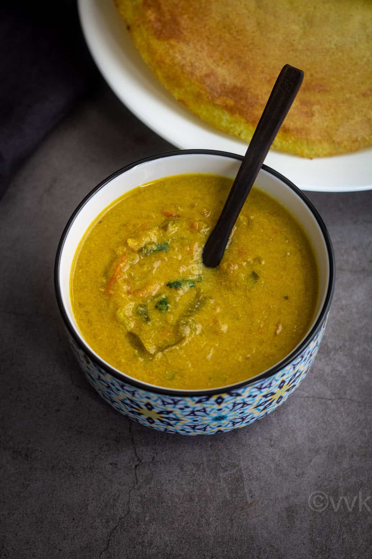 tomato kurma served with dill dosa