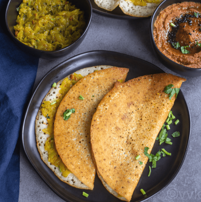 square image of stuffed bottle gourd dosa served in black plate