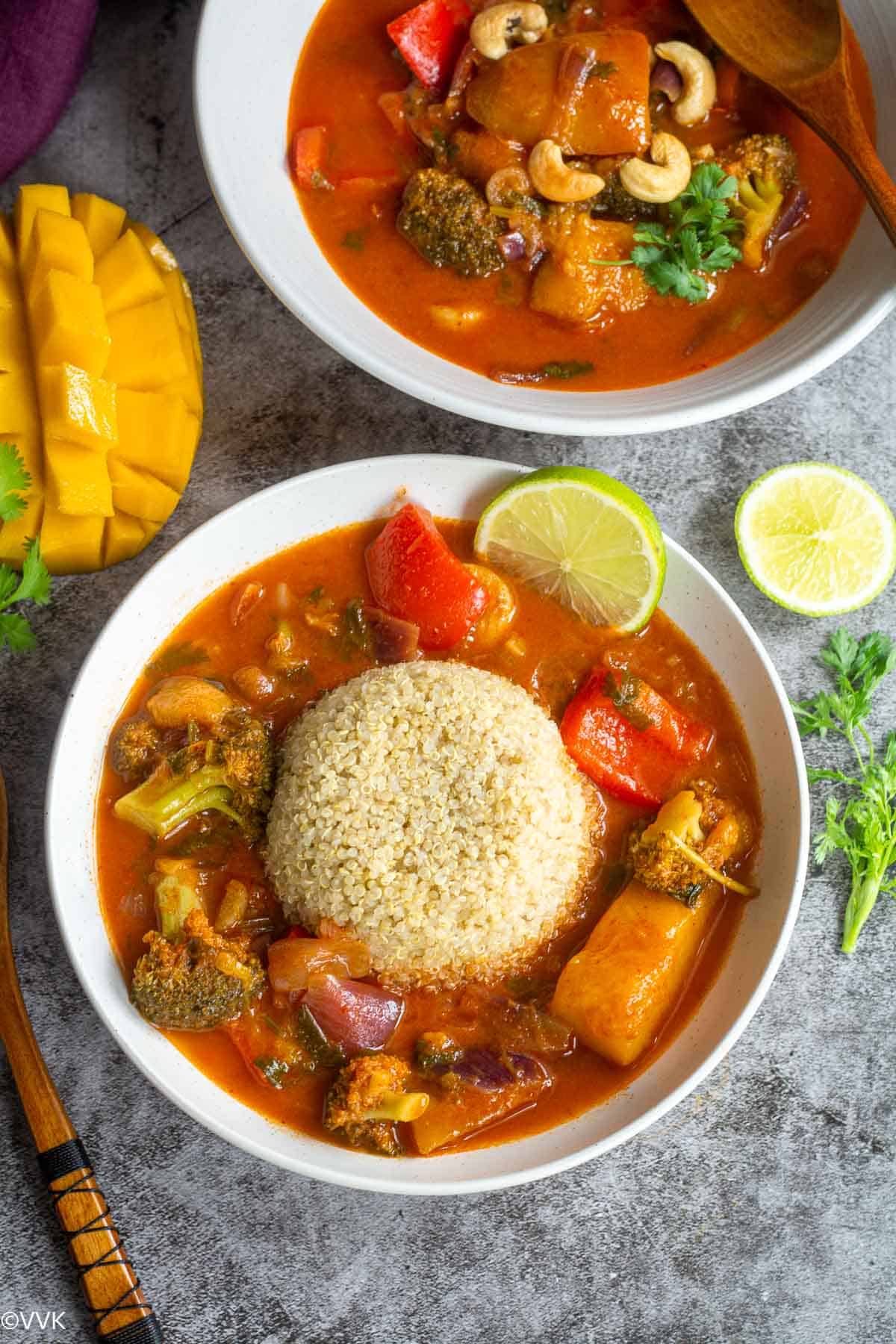 overhead shot of thai mango curry in a bowl and another one served with quinoa