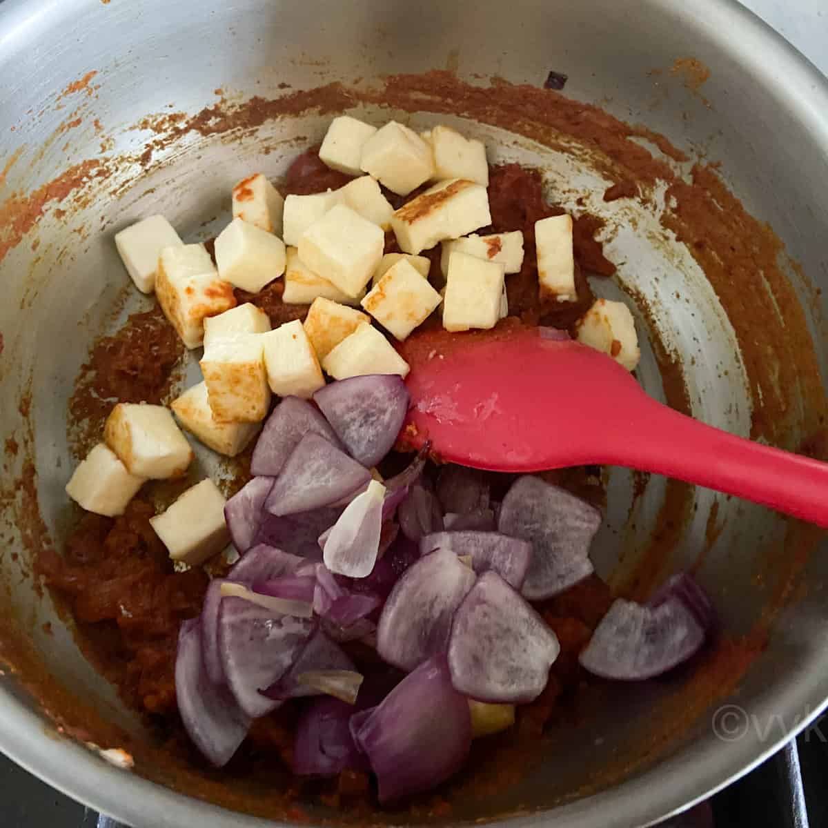 adding the onions and paneer