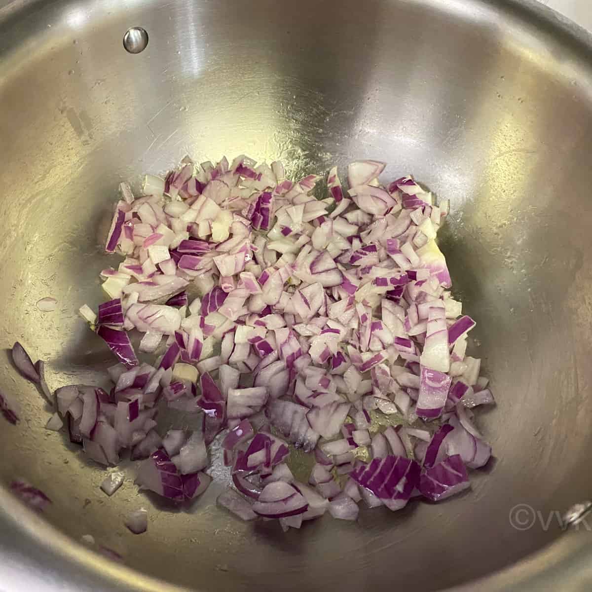 sauteing onions for the paneer