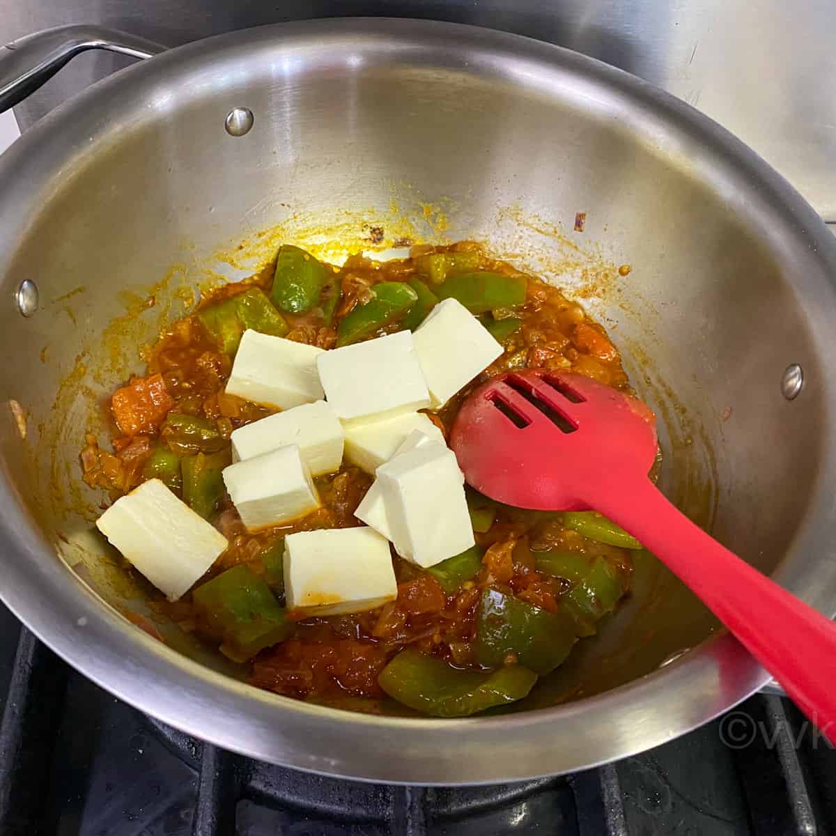 adding the sauces and paneer