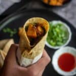 potato roti roll with text overlay for pinterest