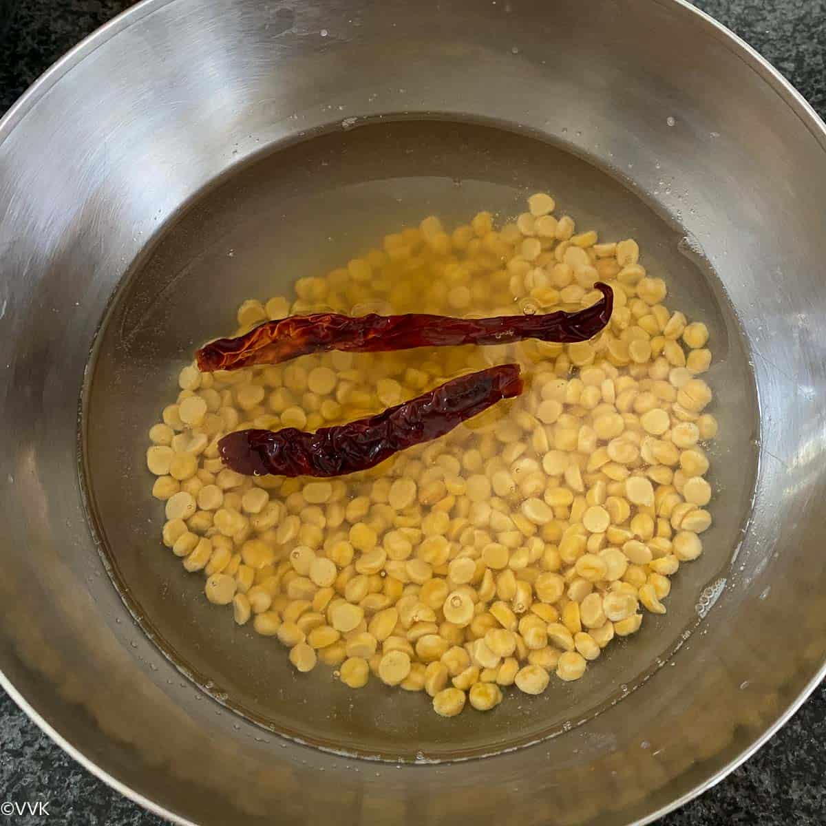 soaking the lentils and chilies for the vadai