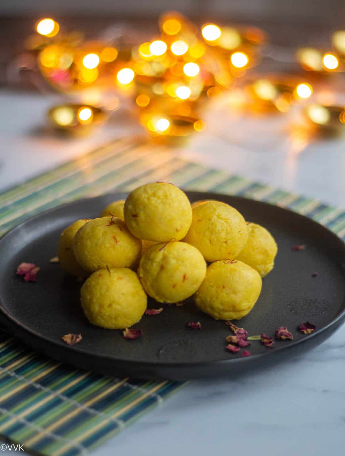 paneer ladoo with light bokeh effect on the background