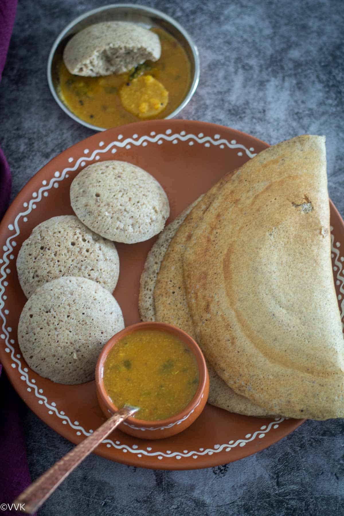 close up shot of millet idli and dosa