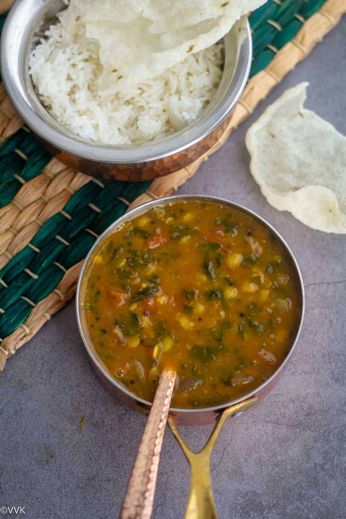vendiya keerai sambar served with rice and papad