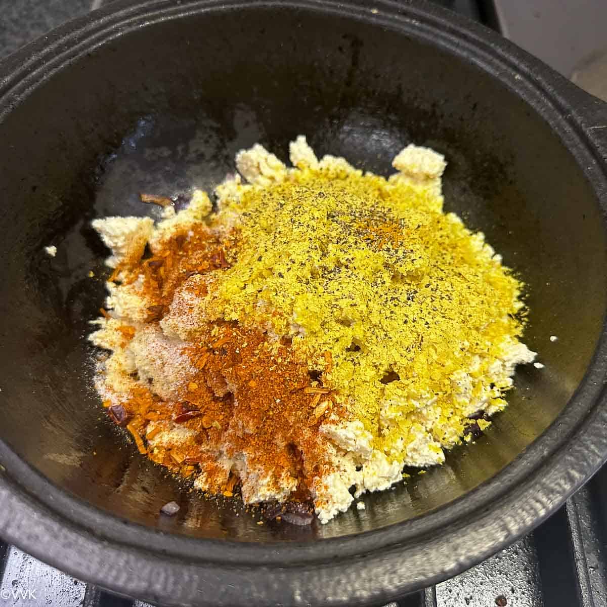adding tofu and all the spices
