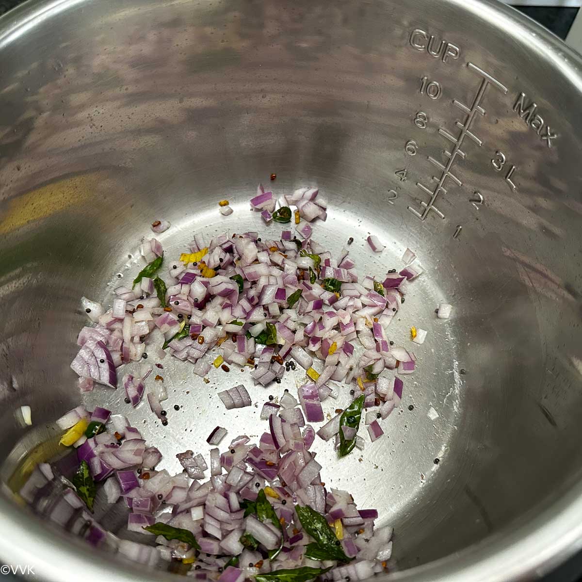 sauteing the chopped onions