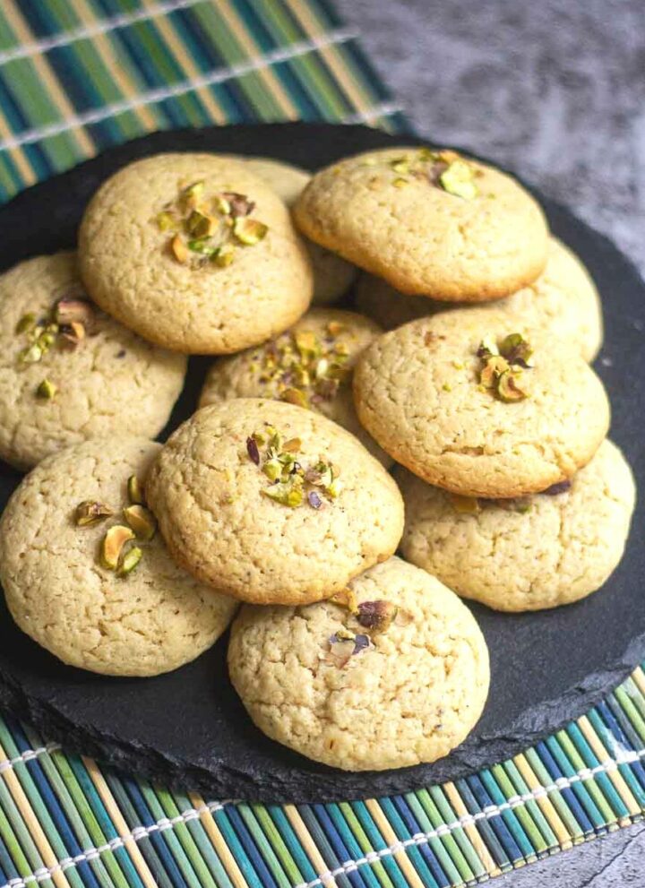 square image of stacked up cookies on a plate