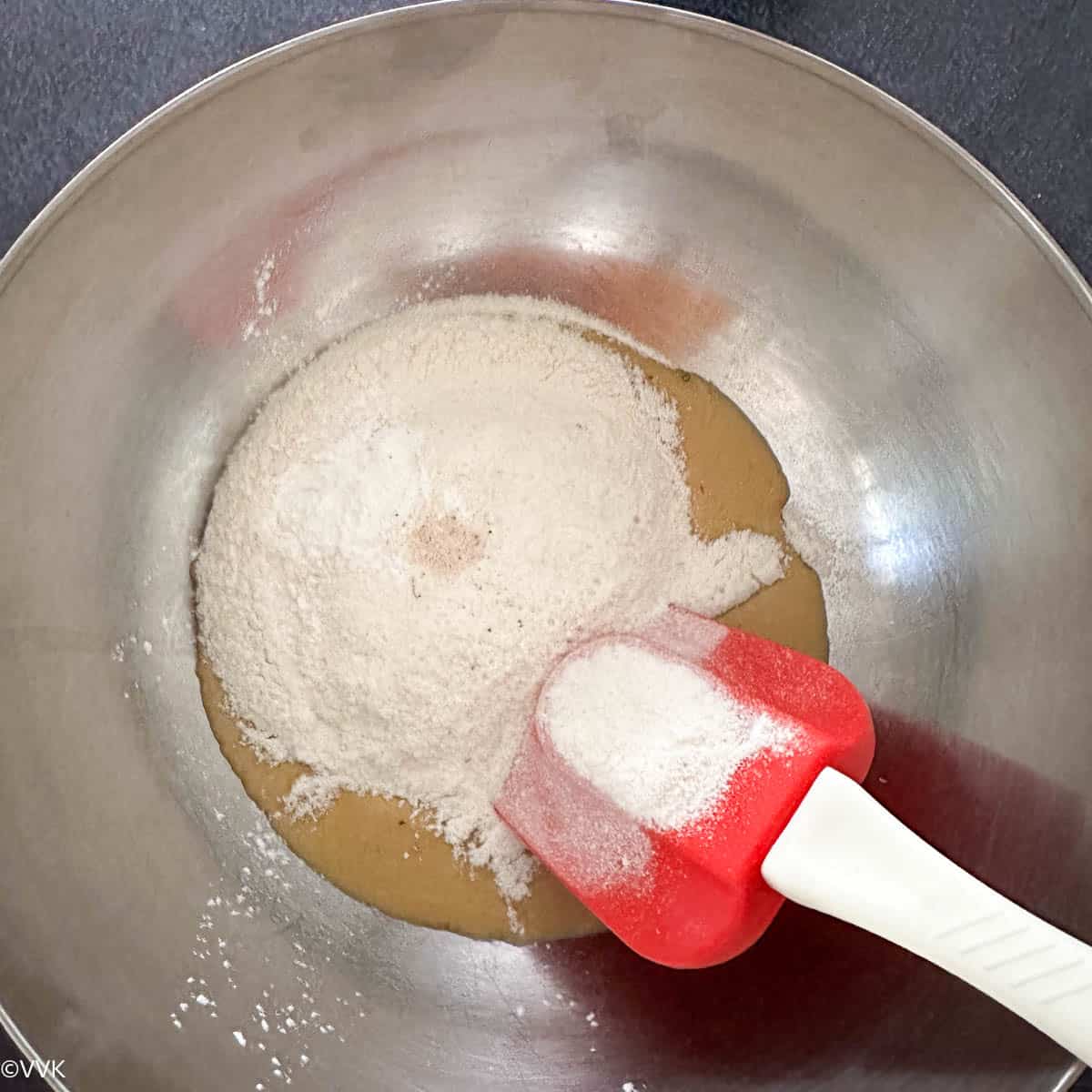 mixing tahini and powdered sugar