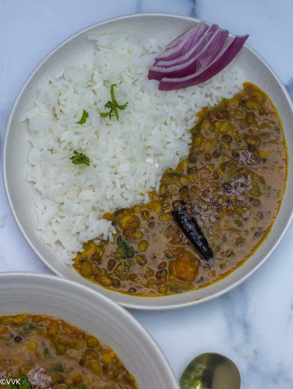 close up shot of panchratna dal serve with rice