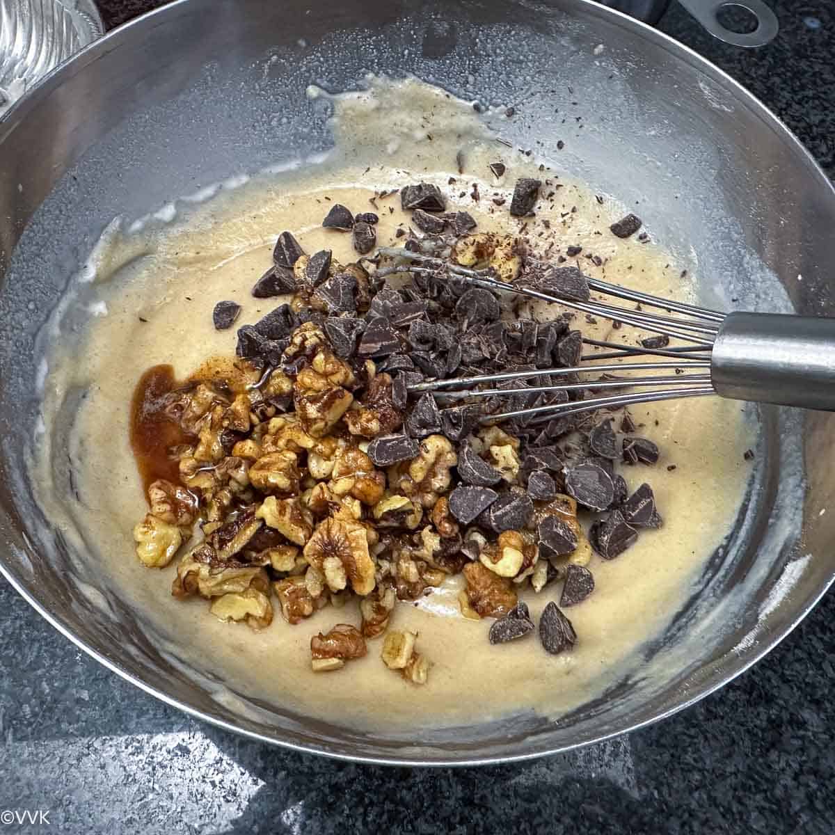 adding walnuts and chocolate chips