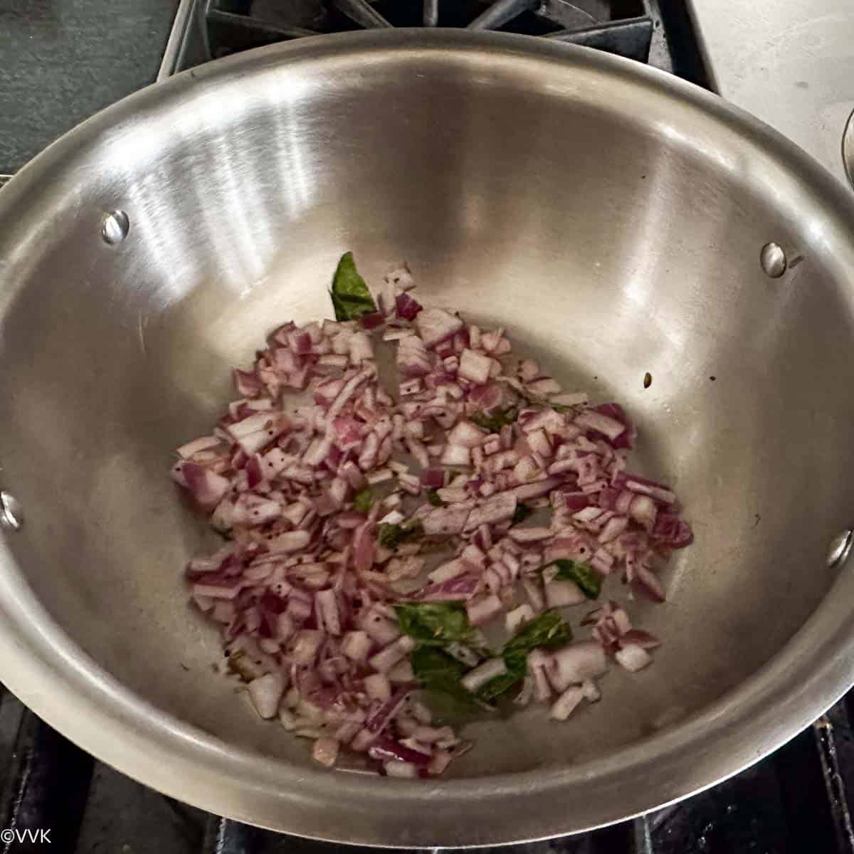 sauteing the spices and onion for gravy