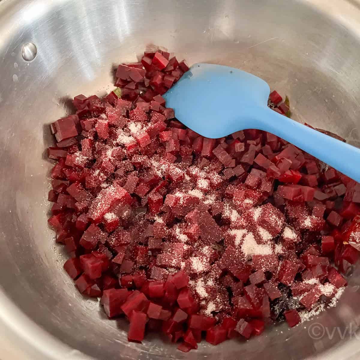 adding steamed, chopped beetroot and salt