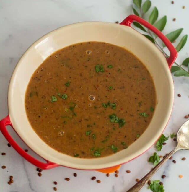 kollu masiyal served in red ceramic serveware