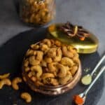 square image of roasted cashews in a gift bowl