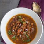 instant pot kala chana curry with text overlay for pinterest