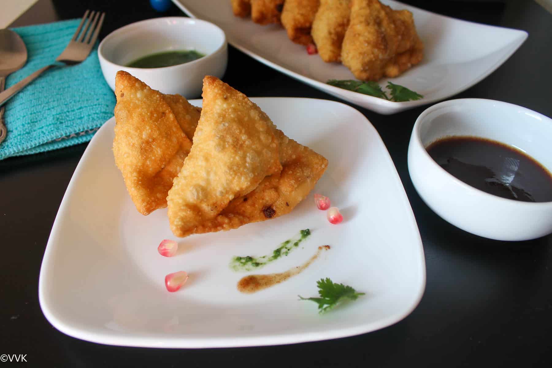 close up shot of two samosa