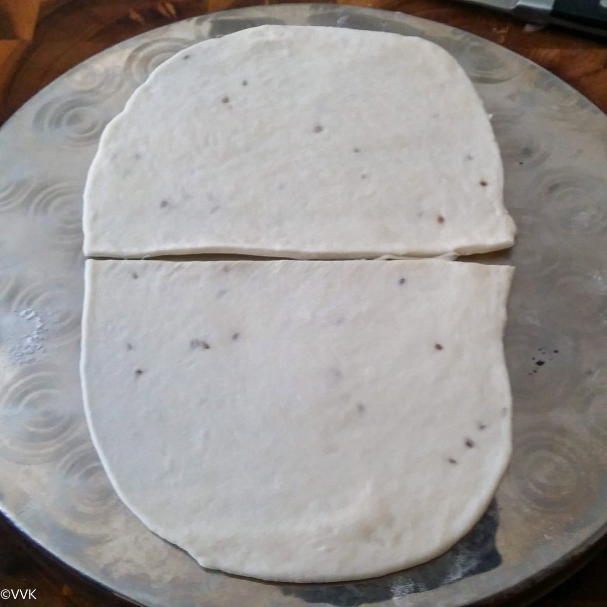 cutting into two halves