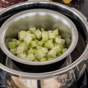 dal and veggie cooking in pot in pot