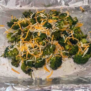 adding the cheese to the broccoli