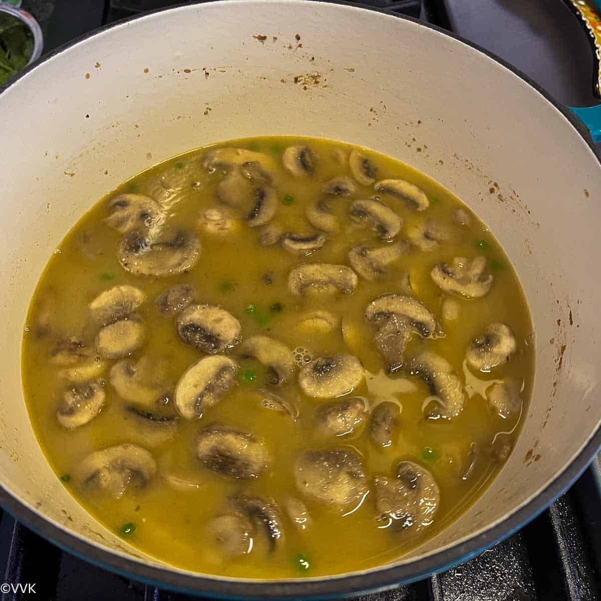 adding water to the biryani