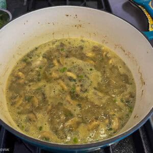 adding lemon juice and mint-cilantro mix