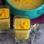 square image of mango chia pudding served in single serve glass