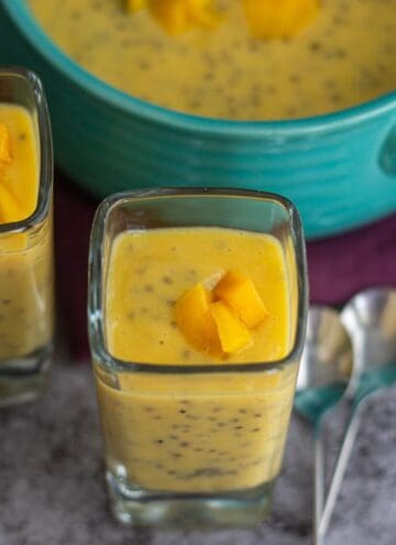 square image of mango chia pudding served in single serve glass