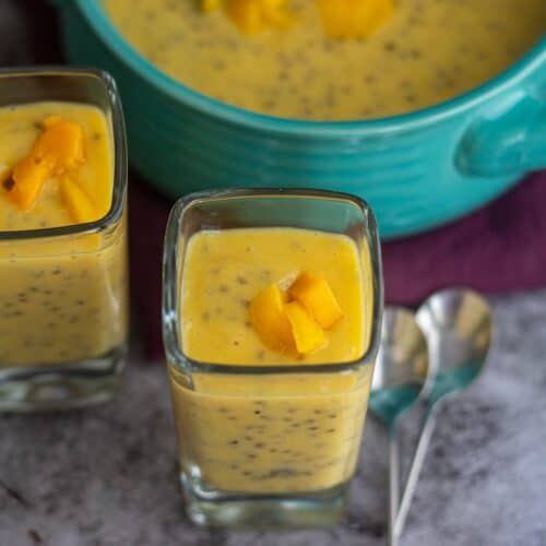 square image of mango chia pudding served in single serve glass