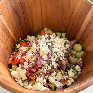 adding feta and dressings