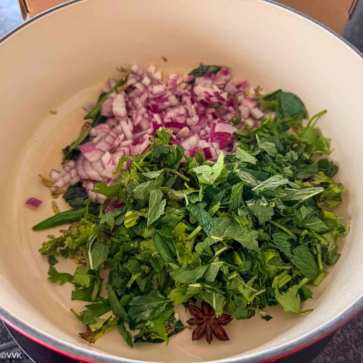 adding aromatics and herbs