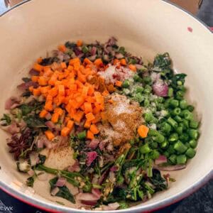 adding veggies and spices