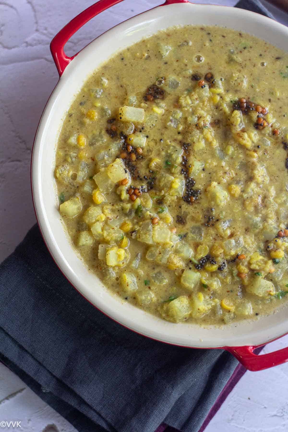 radish kootu served on cermamicware
