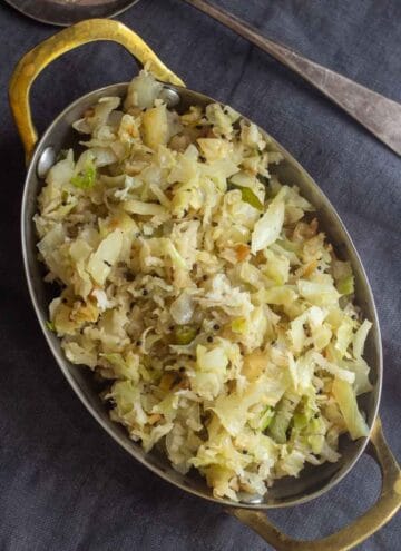 square image of cabbage poriyal served in rectangular tray