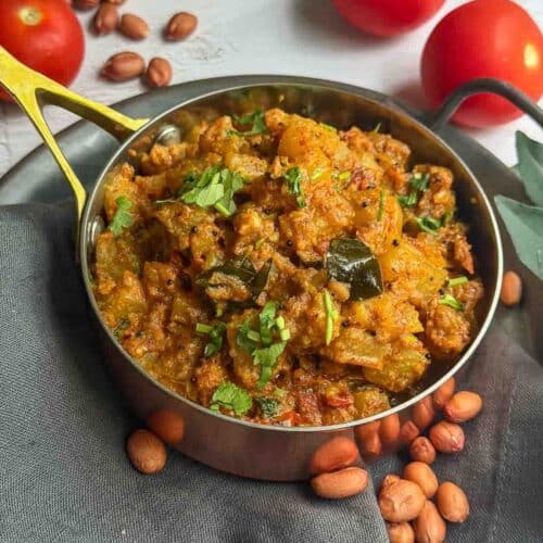 square image of sorakkai masala with peanuts on the side