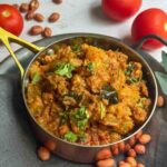 Bottle gourd peanut curry image with text overlay for pinterest